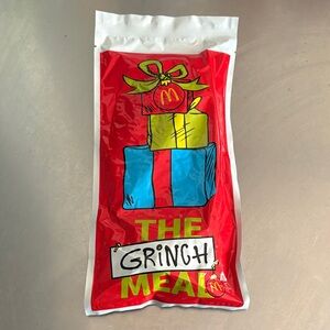 Unsealed McDonald's mystery pair of Grinch meal socks